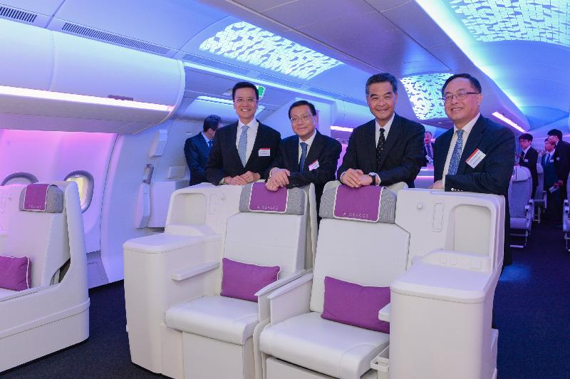The Chief Executive, Mr C Y Leung (right), visits the mock-up centre at Airbus in Toulouse, France, today (June 7, Toulouse time). 